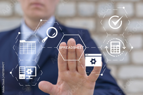 Person using virtual touch screen presses on the word SPREADSHEET. Spreadsheet Worksheet Tables Web Online Electronic Service Document Information Financial Application Concept.