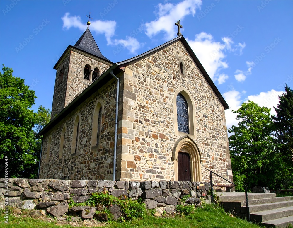 Stone church in a landscape setting Stone church in a landscape setting