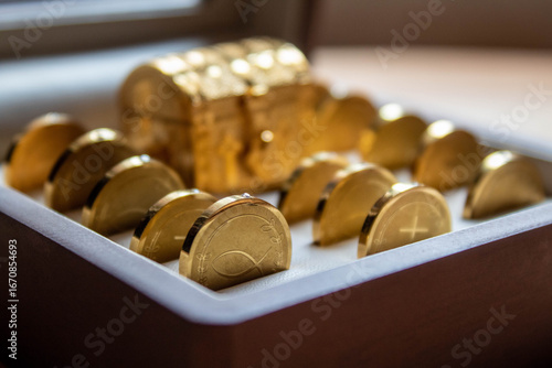 symbolic golden wedding coins detail