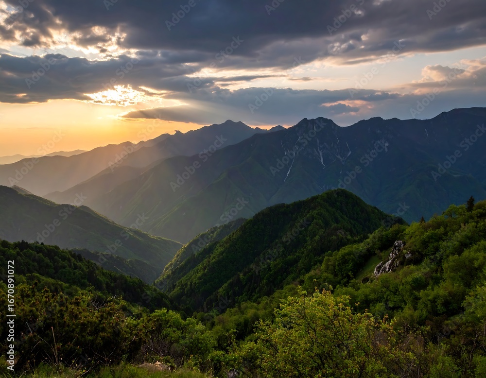 Obraz premium Sunset over mountain valley