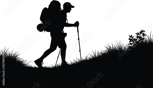Silhouette of a hiker with backpack and trekking poles ascending a grassy hill