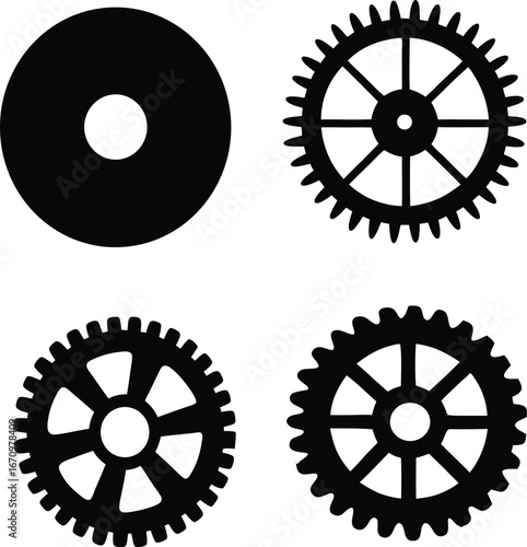 Four black fill vector designs of gears and a circle with a hole, representing mechanisms and industry