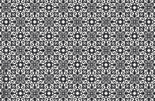 Black and white geometric damask pattern wallpaper with ornamental designs and intricate swirls, a classic and elegant background