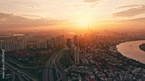 Panoramic view of Saigon, Vietnam from above at Ho Chi Minh City's central business district. Cityscape and many buildings, local houses, bridges, rivers 