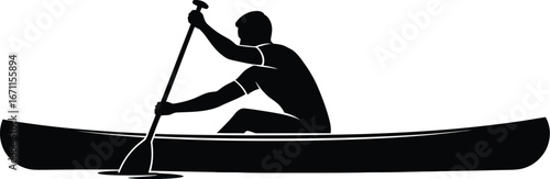 Silhouette of a man paddling a canoe water