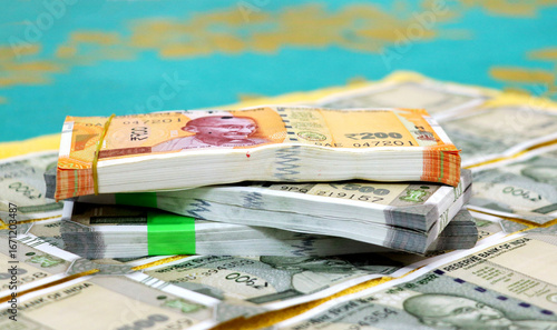 piles of new indian currency notes rupees 50,100,200 and 500