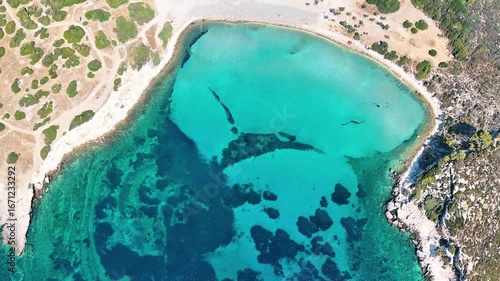 4K video of Demircili Bay with its turquoise beaches and magnificent peninsula in Urla. Izmir, Turkiye.