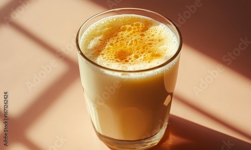 Fresh, non-homogenized glass of milk with a rich, creamy top layer, symbolizing high-quality, eco-friendly dairy farming practices, Generative AI