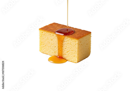 Perfectly cut golden-brown hasty pudding slice with maple syrup drizzle on a small white ceramic plate, isolated on transparent, 45-degree high-angle, commercial food concept