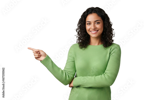 A beautiful young adult woman with curly dark hair, smiling and confidently pointing to the left, isolated on transparent background