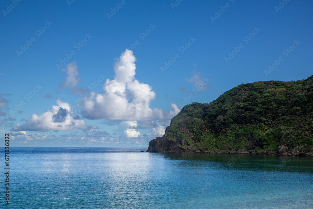 Fototapeta premium 奄美の夕景。イメージ。夏雲。