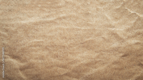Rumpled brown cardboard paper texture background. Crumpled brown paper texture vintage background.
