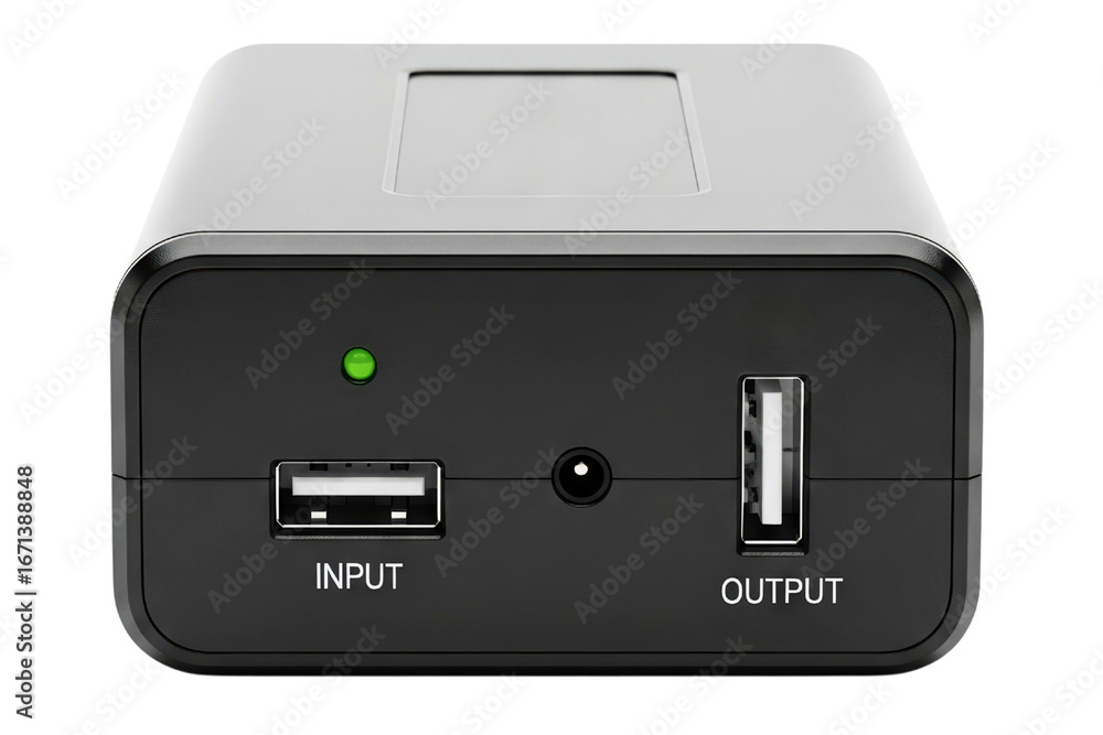 Obraz premium Black portable power bank charger with input and output ports isolated on a transparent background