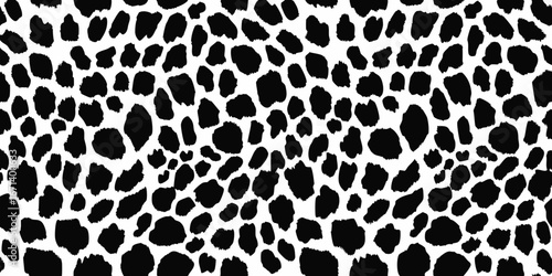 Seamless black and white dalmatian spots pattern for animal print backgrounds
