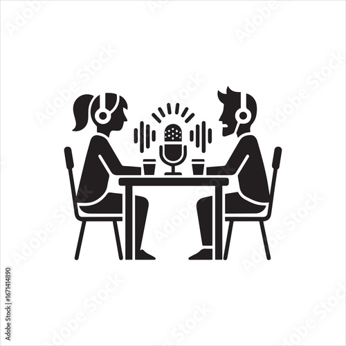 Podcast Recording Two People with Headphones and a Microphone at Table.