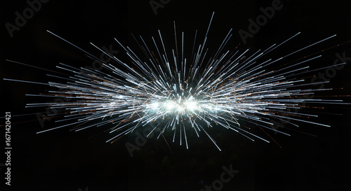 Wallpaper Mural Starburst fireworks explosion at night with white radial light trails and sparks on black background, long exposure pyrotechnics, glittering particles, festive abstract celebration backdrop with copy  Torontodigital.ca