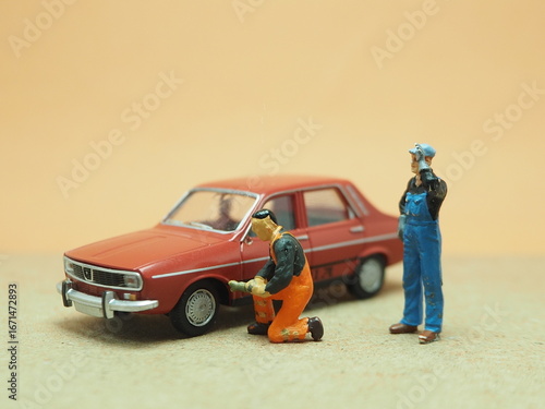 Fotografía Mini toy of action figure at table with blurred background