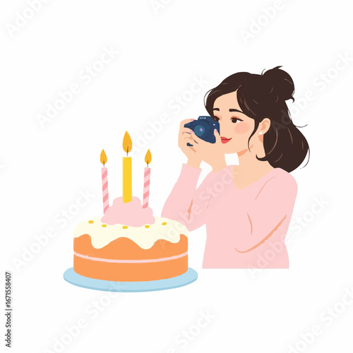 A girl is photographing a birthday cake with candles.