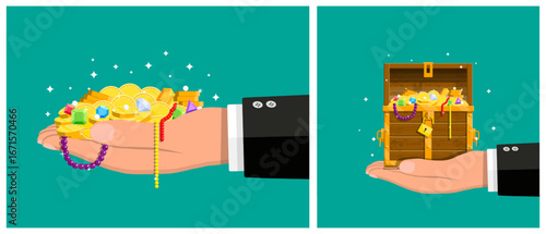 Man hand holding open wooden chest full of gold coins, jewelry, and gems. Pirate treasure concept for history and adventure.
