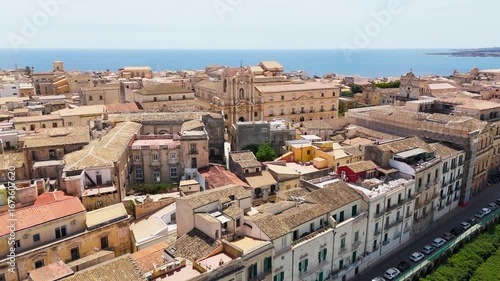Aerial Drone Shot Approaching Cattedrale Metropolitana In Ortigia, Syracuse, Sicily, Italy On A Bright Summer Day.