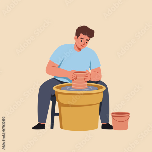 Man Shaping Clay on Potter's Wheel in Studio