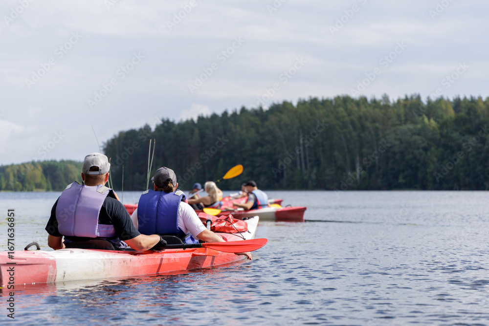 Naklejka premium Kayak Team on an Open Lake