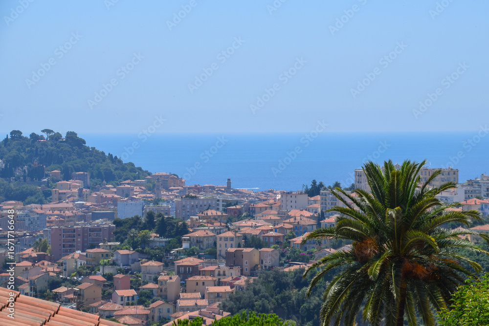 Obraz premium Aerial view of rooftops and the sea, Nice, South of France