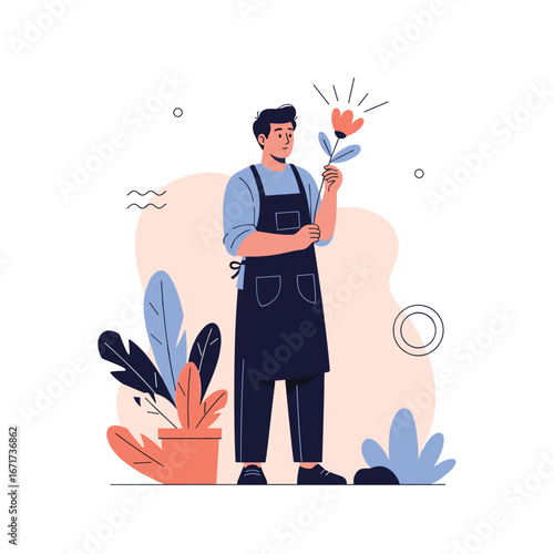 A male gardener carefully examines a small flower with plants around him