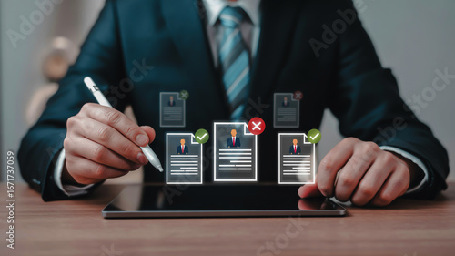 Person in suit reviewing resumes on tablet with digital checkmarks and crosses hiring recruitment