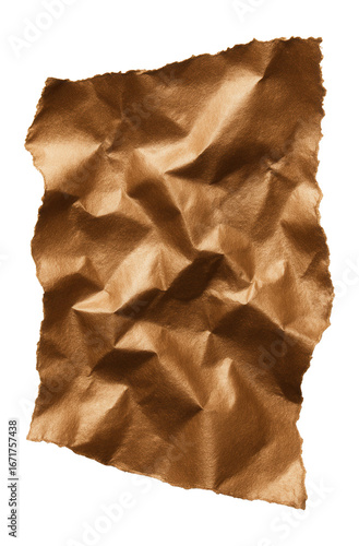 Torn piece of metallic bronze paper