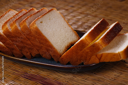 Indian breakfast soft bread for eating with Tea or Milk isolated on jute background 