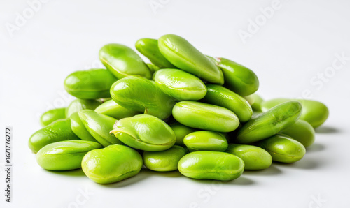 Wallpaper Mural A small pile of green fava beans on a white background Torontodigital.ca