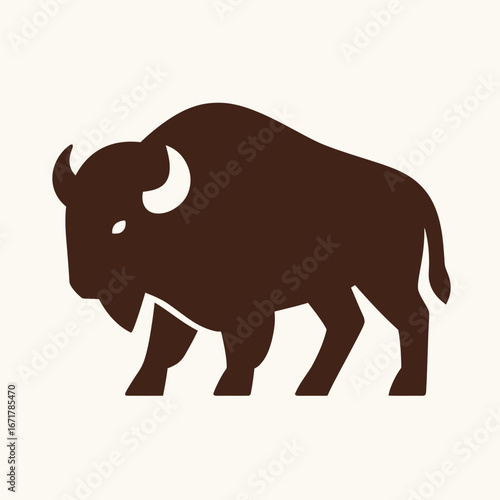 Bold Black Bison Silhouette Illustration on Light Background