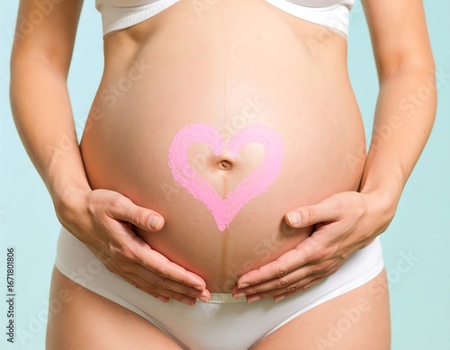 Wallpaper Mural Pregnant belly with a pink heart painted on it Torontodigital.ca