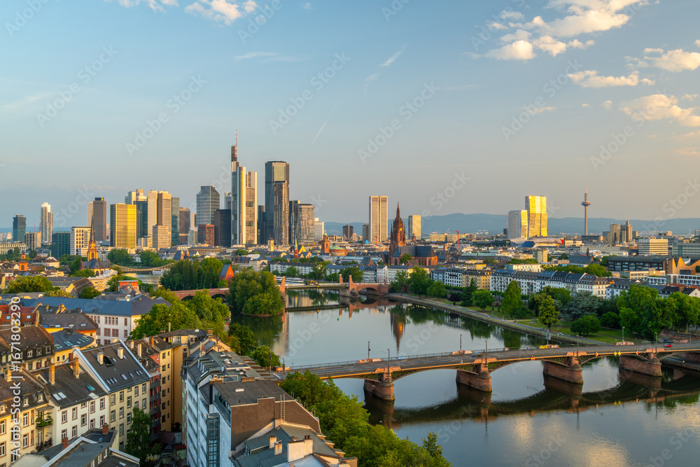 Obraz premium Frankfurt City Skyline, Residential Buildings, Bridges and Main River at Sunrise. Aerial View. Golden Hour. Hesse, Germany