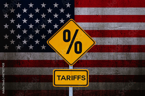 Tariffs. Yellow road sign tariffs on background of American flag, concept. Trade wars and crisis, creative idea. US Trade policy. Tariffs
