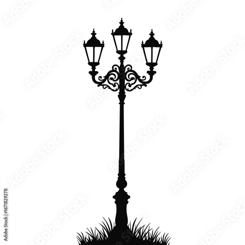Black silhouette of a vintage triple street lamp with ornate details