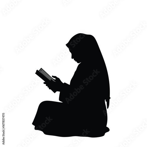 Black silhouette of a woman wearing a hijab reading a book
