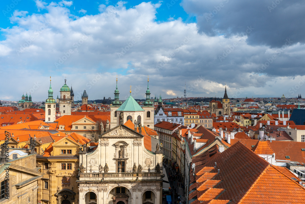Obraz premium Historic Rooftops and Church Towers of Prague Old Town, Czech Republic