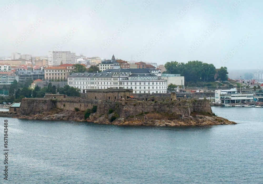 Obraz premium Historic Fortress on Rocky Island in Port of a Coruna Spain