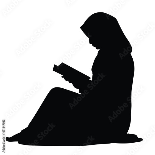 Silhouette of a person wearing a hijab reading a book 6