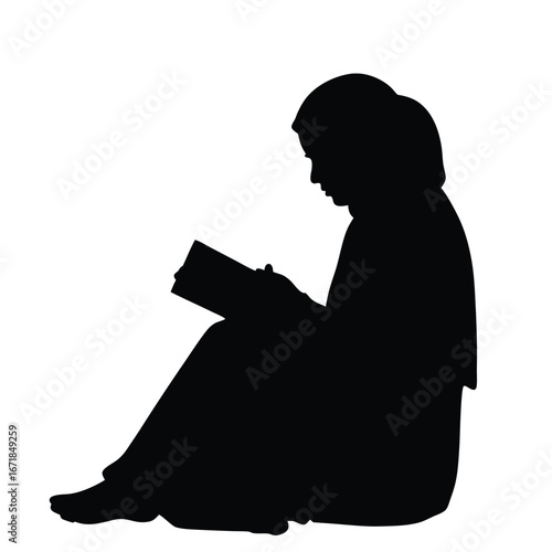 Silhouette of a person wearing a hijab reading a book 7