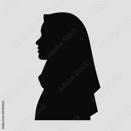 Black silhouette profile of a woman wearing a hijab