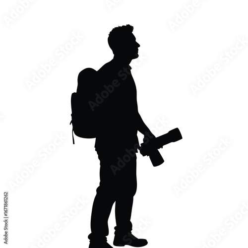 Silhouette of a man with backpack and camera person