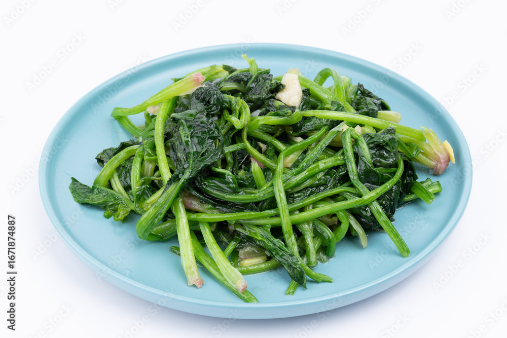 The stir-fried spinach with vegetables on the plate The stir-fried spinach with vegetables on the plate