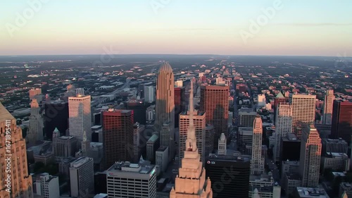 Wallpaper Mural Picturesque urban landscape with towering skyscrapers stretching towards the horizon, reflecting light at sunset, showcasing metropolis infrastructure, and urban development Torontodigital.ca