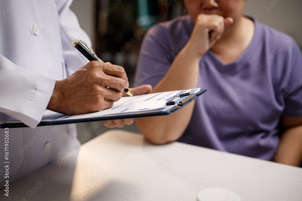 Fototapeta premium overweight Asian woman consults with a health expert in a private office, discussing wellness, lifestyle changes, and medical advice. The scene reflects guidance, support