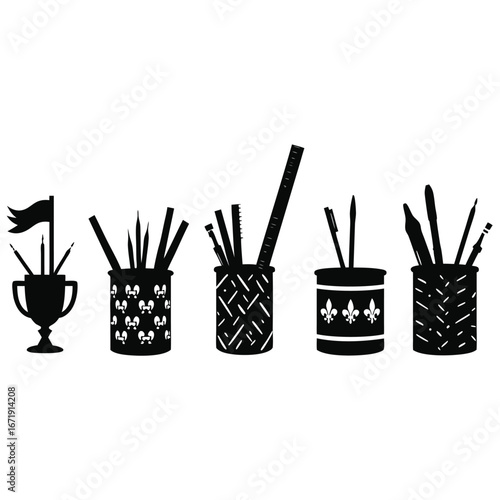 Black silhouette desk organizers with writing tools and ruler