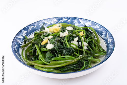 The stir-fried sweet potato leaves on the plate