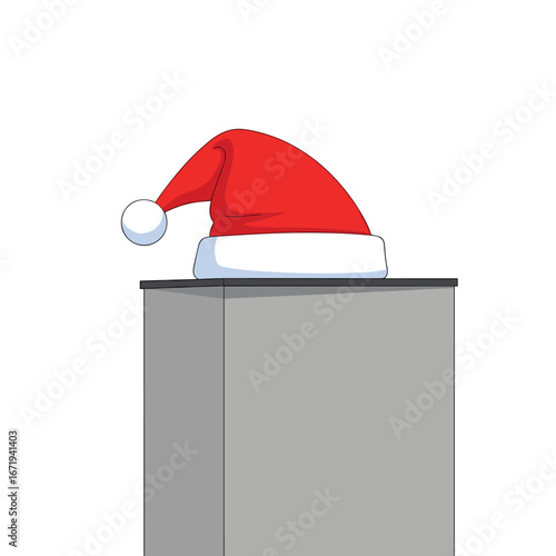 Festive santa hat adorning a tall gray pedestal creating a holiday display scene